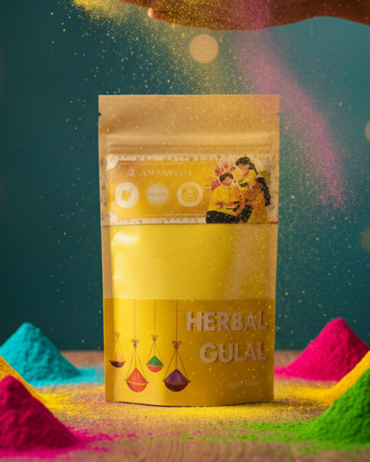 Yellow package of herbal gulal with colorful gulal powder around it on a dark background